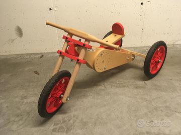 Bici/triciclo in legno di Baby Moto.