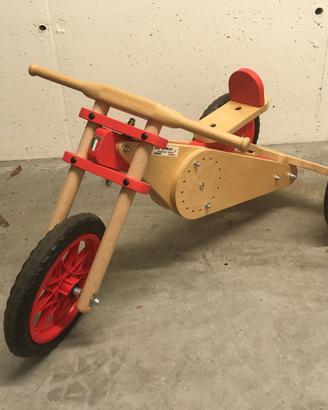 Bici/triciclo in legno di Baby Moto.