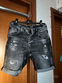 Jeans short strappati