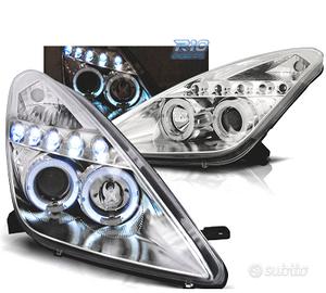 FARI TOYOTA CELICA T23 99-05 LED OCCHI ANGEL CROMA