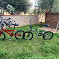 bici rossa tipo bmx con ruote da 14