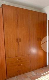 armadio con ante e cassetti 