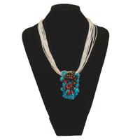 collana beige ciondolo pietre dure rosse nere blu