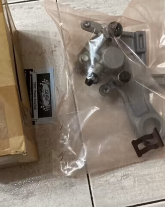Pinza + staffa freno post. honda cr 125 250 05-07