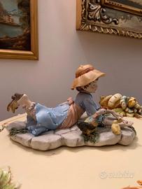 Bambina con pulcini Volta