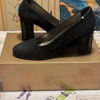 Scarpe con tacchi alti