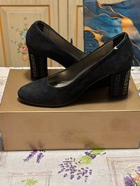 Scarpe con tacchi alti