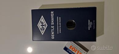 Rasoio apertura a farfalla