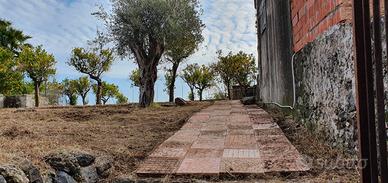 Immobile e terreno edificabile