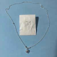 Gioielli in argento con zirconi brillanti