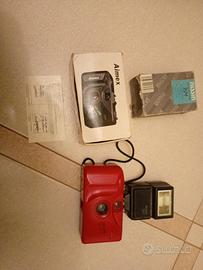 fotocamera vintage Aimex SP-500 con flashNISSIN16M