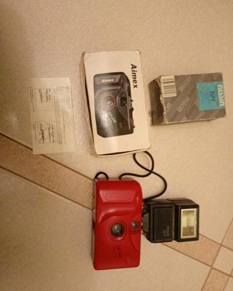 fotocamera vintage Aimex SP-500 con flashNISSIN16M