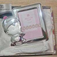 Cornice bimba argento