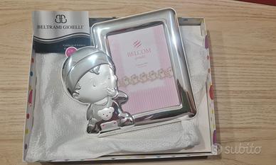 Cornice bimba argento