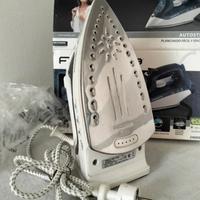 Ferro a vapore verticale Roventa