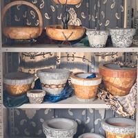 vasi ricoperti in sasso o legno