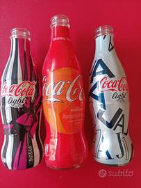 Bottiglie in vetro Coca-Cola da collezione.