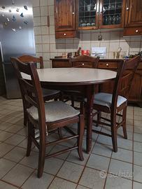 Tavolo da pranzo rotondo allungabile con sedie