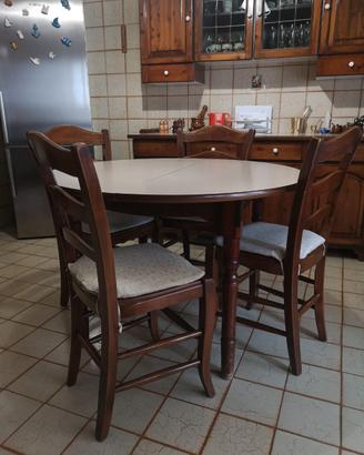 Tavolo da pranzo rotondo allungabile con sedie