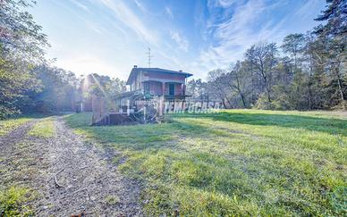 PORZIONE DI BIFAMILIARE CON GIARDINO!