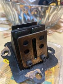 Collettore e pacco lamellare polini