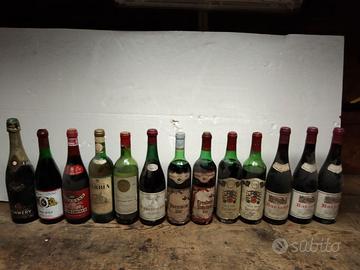 12 bottiglie vino annate 1973 e 1 di champagne