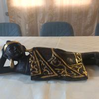 Scultura in legno Madeira distesa orientale