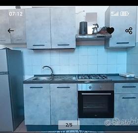 cucina, tavolo e sedie, armadio, divano letto