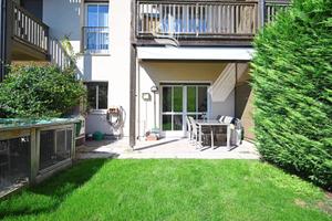 Cortaccia: Casa a schiera curata con giardino priv