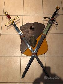 Spade medievali con supporto in legno