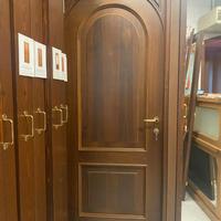 PORTA INTERNA CON APERTURA CENTINATA