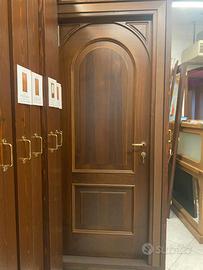 PORTA INTERNA CON APERTURA CENTINATA