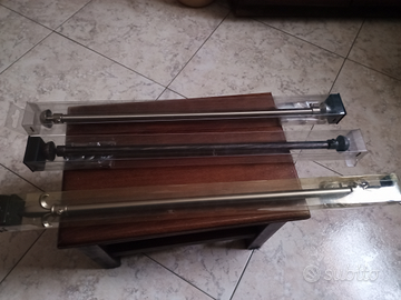 Bastoni per tende allungabili in metallo