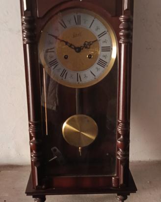 orologio a pendolo da muro