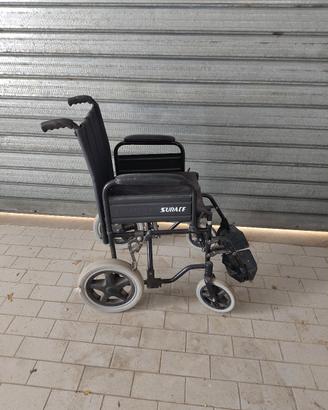 sedia a rotelle Surace
