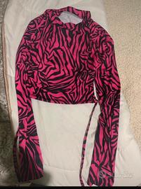 Maglia con lacci con schiena scoperta .