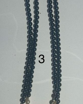 Collana con pendente circolare in perle scure