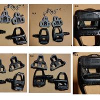 componenti vari :pignoni,pedali,ruote,sella,casco