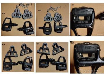 componenti vari :pignoni,pedali,ruote,sella,casco