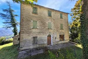 DOVADOLA - CASA INDIPENDENTE CON TERRENO AGRICOLO