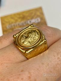 Anello oro giallo con testa di donna