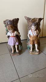 Coppia vasi in ceramica con bambini