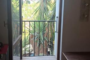 Porzione di villa con giardino