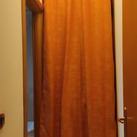 Tenda a pannello con anelli 