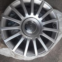 Cerchi orig Audi  17"  diamantati.Coprimozzi nuovi