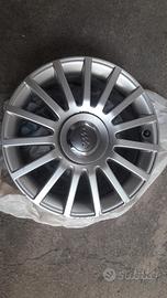 Cerchi orig Audi  17"  diamantati.Coprimozzi nuovi