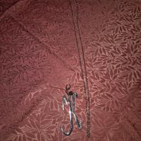 Collana con ciondolo lettera K
