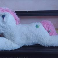 Unicorno magico di peluche