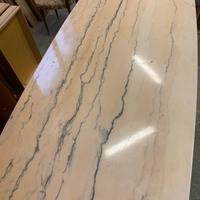 Tavolo con piano in marmo rosa
