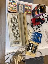 Lotto commodore 64 “biscottone” +accessori +giochi